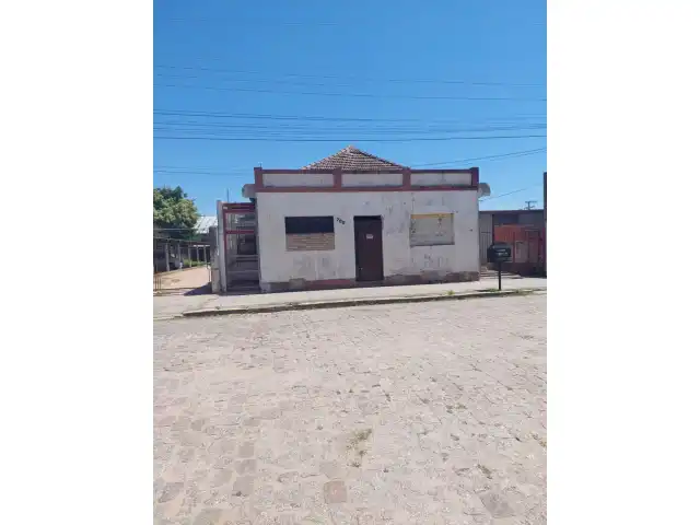 TERRENO com área superficial de 395,78m², situado na zona urbana desta cidade de Tapes/RS