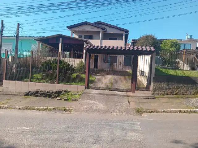 UM IMÓVEL E SEU RESPECTIVO TERRENO URBANO, situado rua Santa Helena nº 257 Gravataí no loteamento RESIDENCIAL DONA IDALINA