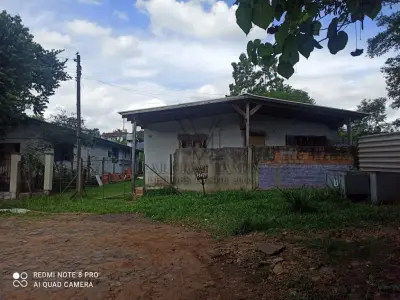 LOTE 000 - Um Terreno Urbano, onde possui uma Casa de Alvenaria com aproximadamente 51,62 metros quadrados