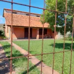 LOTE 241 - Um Imóvel e seu respectivo terreno, situado neste município, na praia de Santa Terezinha-Imbé