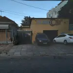 LOTE 135 - UM IMÓVEL DE ALVENÁRIA E SEU RESPECTIVO TERRENO