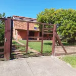 LOTE 241 - Um Imóvel e seu respectivo terreno, situado neste município, na praia de Santa Terezinha-Imbé