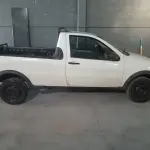 LOTE 418 - UM AUTOMOVEL FIAT/STRADA FIRE, ANO 2011, MODELO 2012
